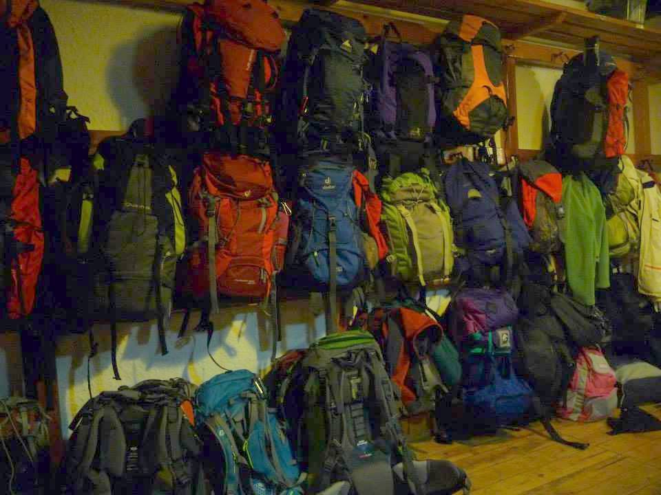 Backpacks in Foyer in Hut Trekking Carros de Foc Pyrenees Spain Jul 2013