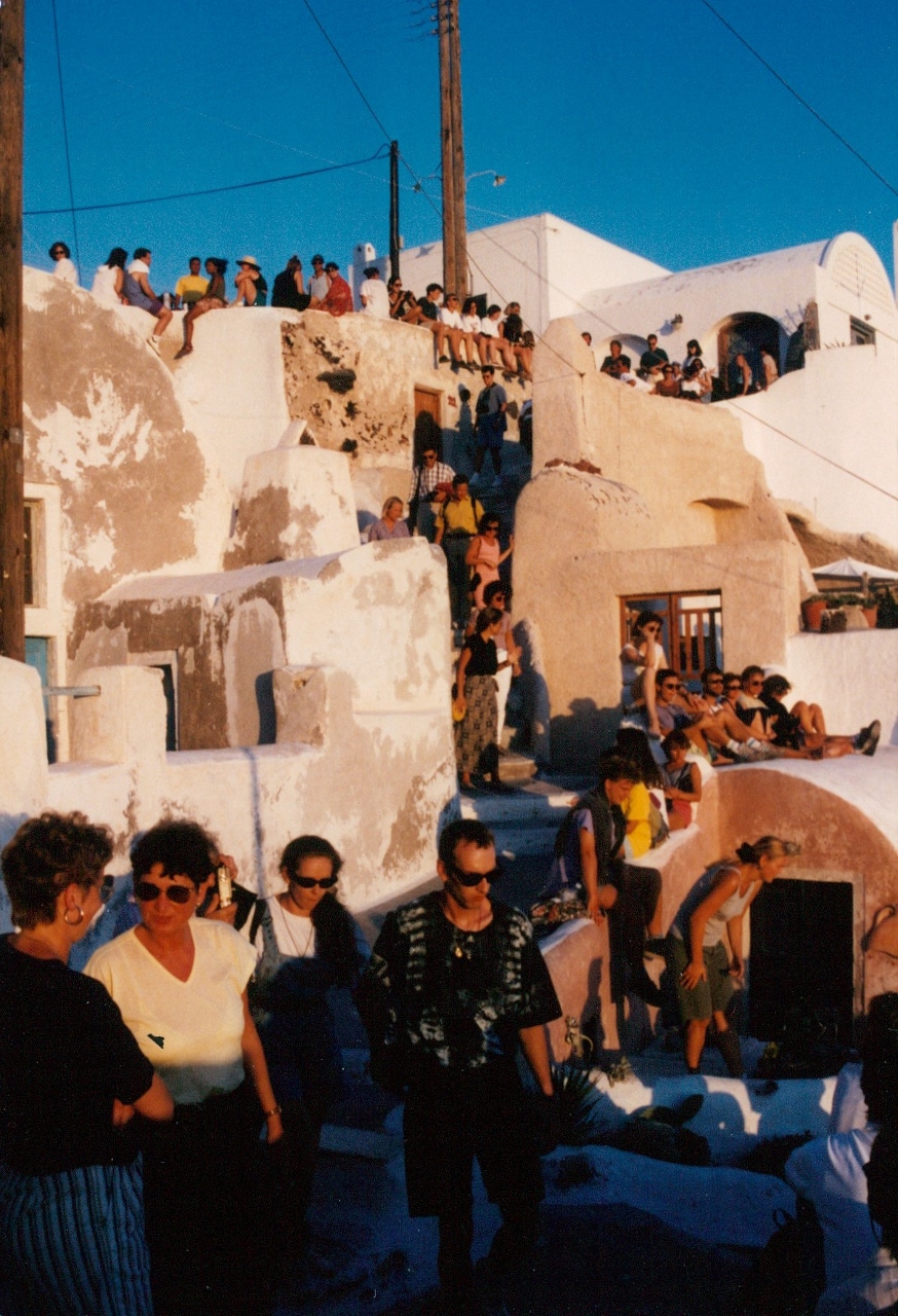 crowd watching sunset santorini island greece 1995