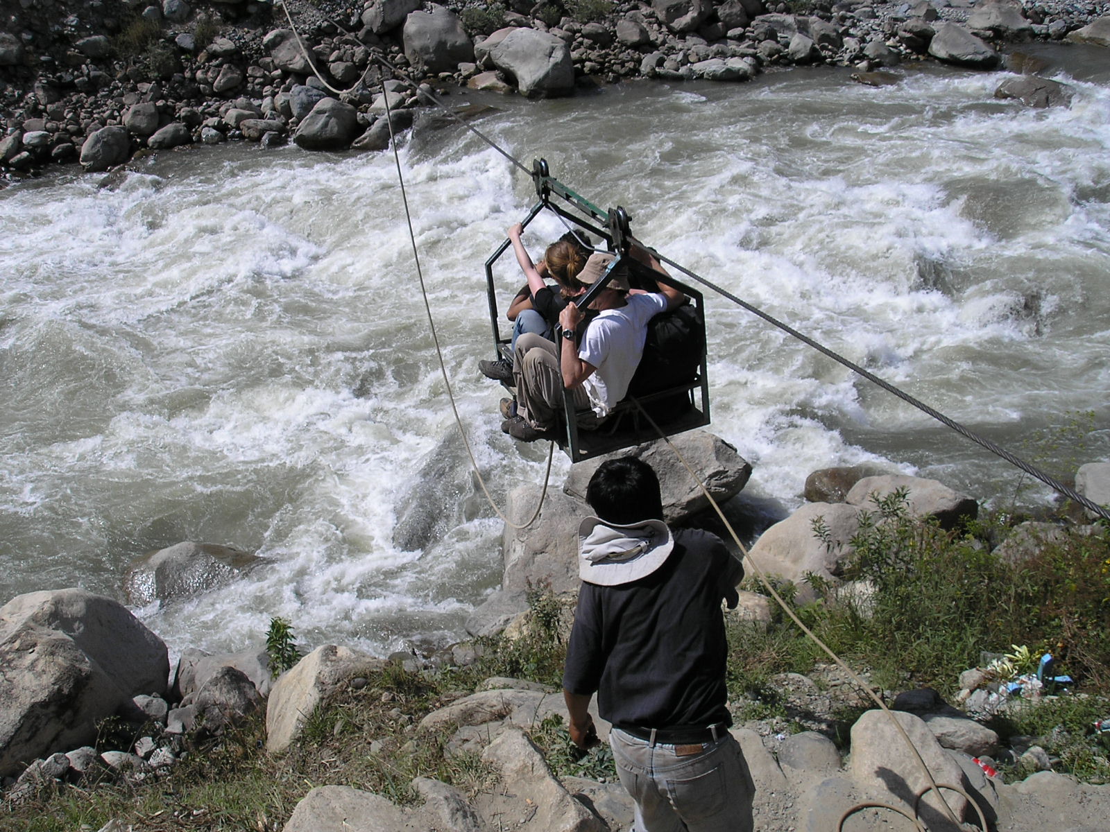 Crossing the Urubamba River on cable at Santa Teresa Salkantay Trek Peru May 2006