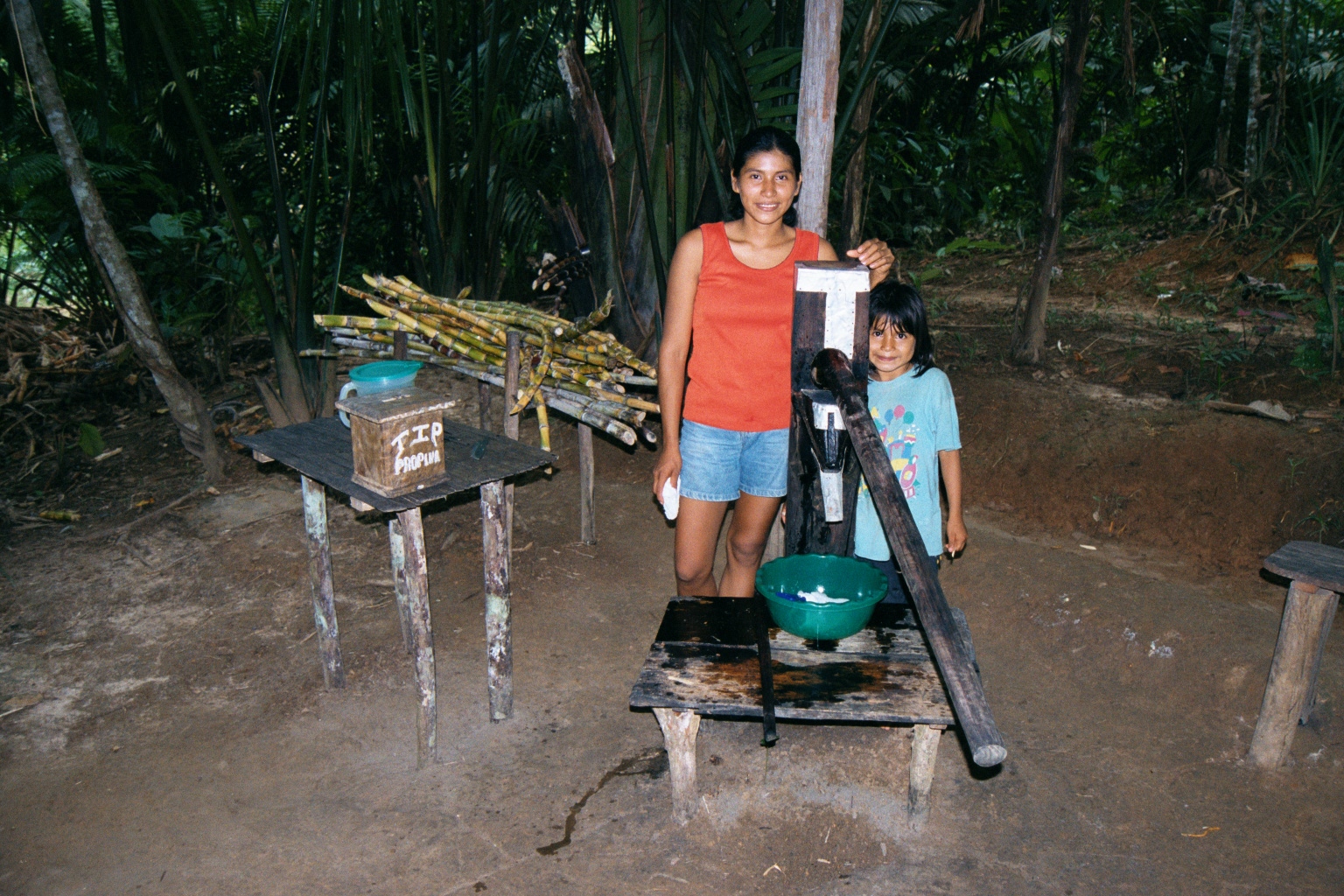 Locals selling fresh juice near Sinchucuy lodge - Iquitos Peru - feb 2002